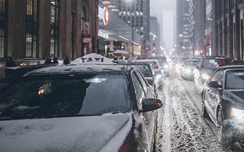 Driving a taxi in snow and ice