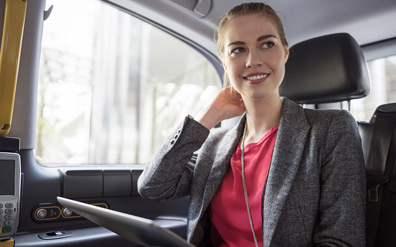 passenger sitting in a taxi